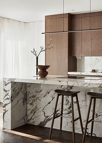 Natural Wood Kitchen with Marble Island and Fluid L-Shaped Layout